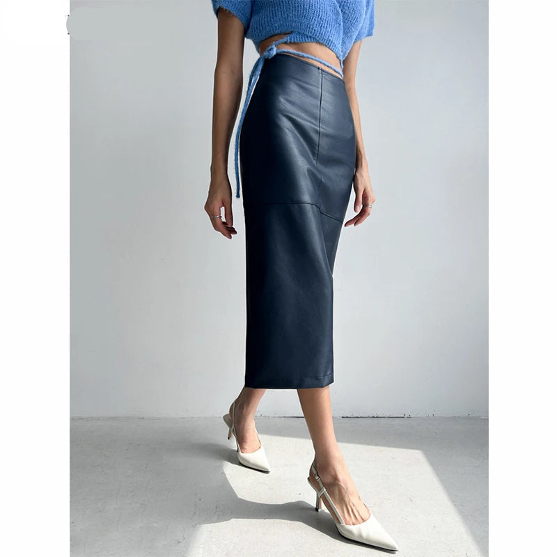 Model posing confidently in the elegant PU leather skirt