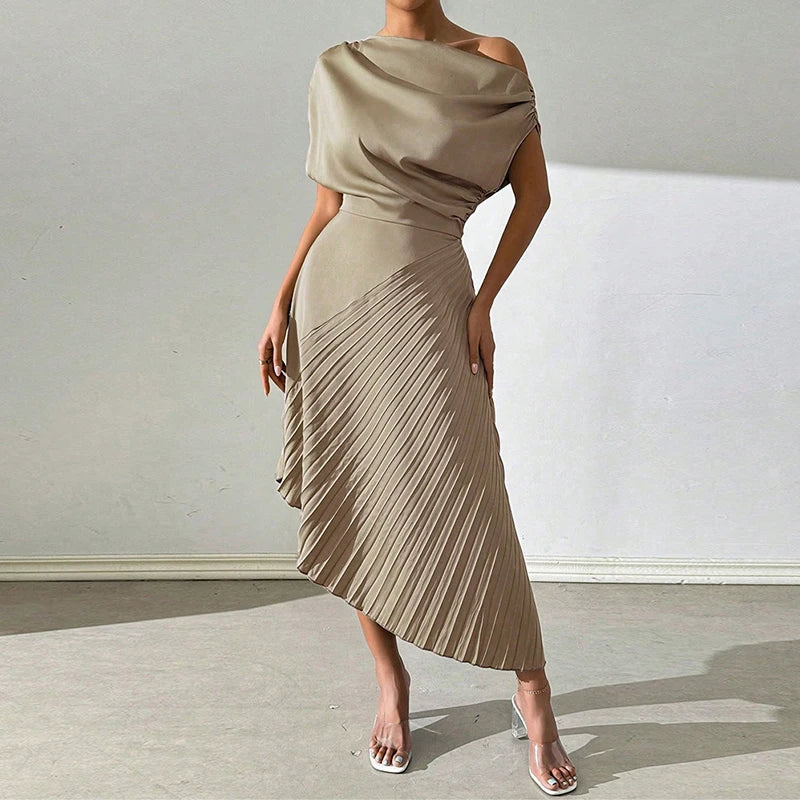 Model in Elegant Ruffled Design Irregular Dress at an outdoor event