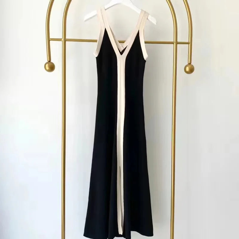Comfortable black dress with elegant silhouette.