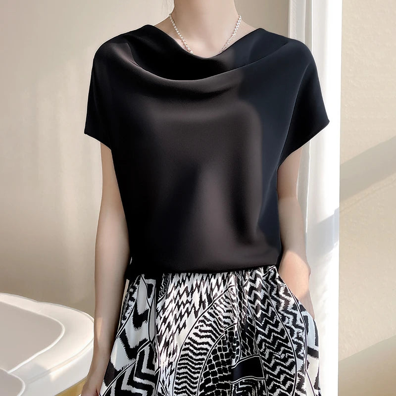 Comfortable women's loose-fit sleeve tee in multiple colors.