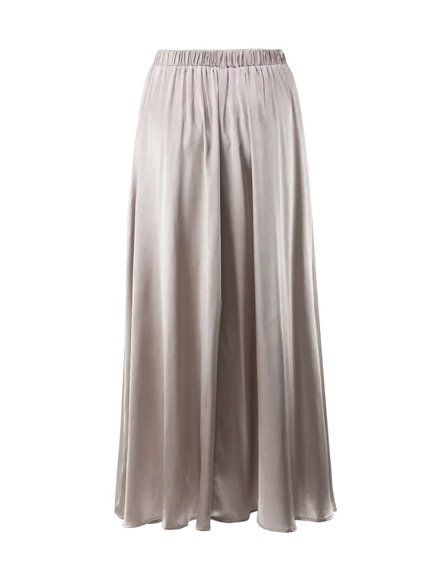 Elegant skirt styled with a turtleneck sweater.