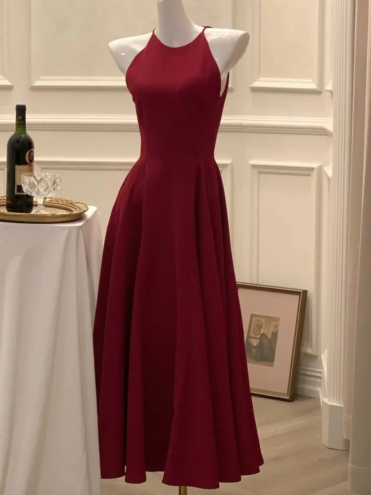 Side profile showcasing the flattering silhouette of the midi dress