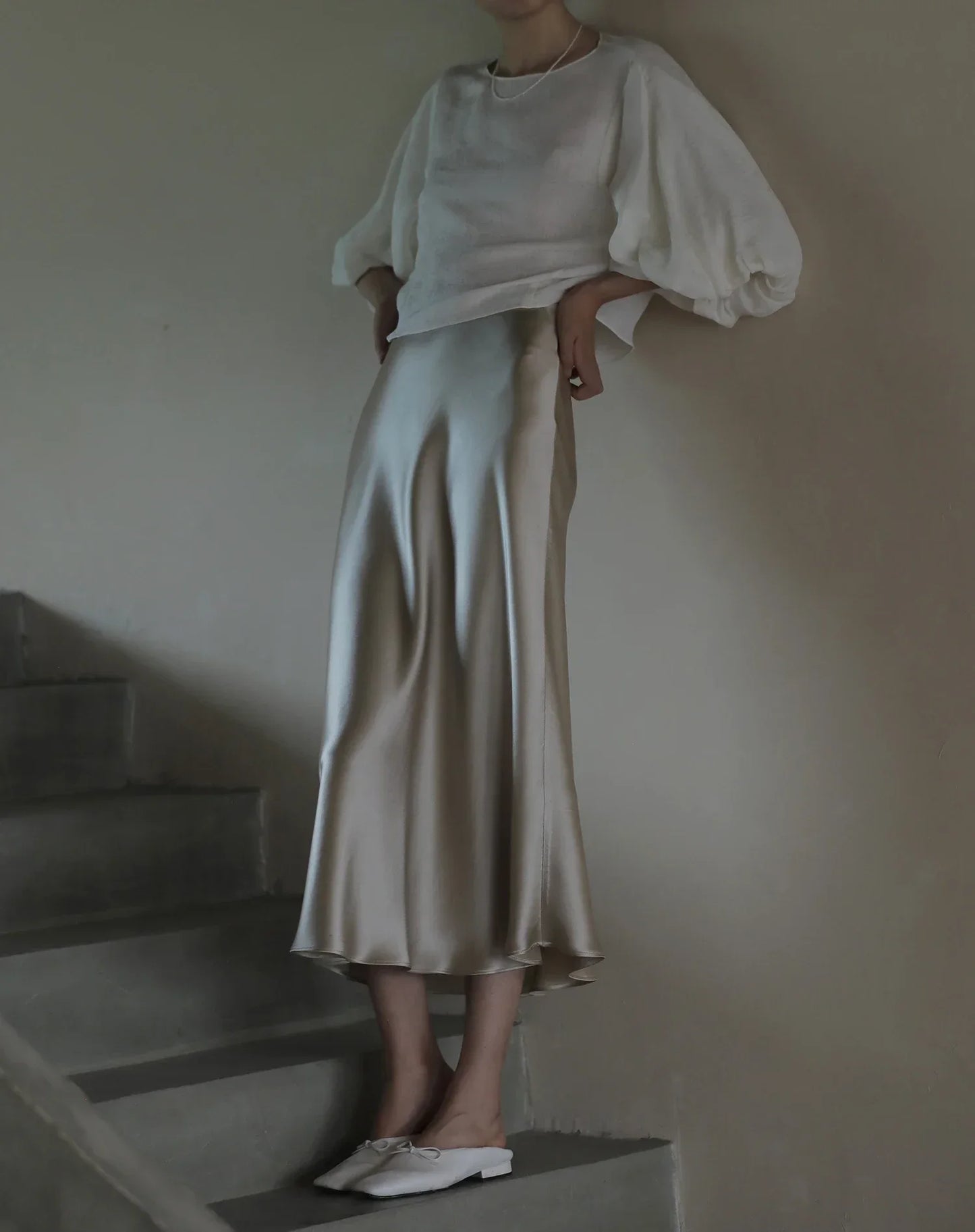 Korean fashion-inspired skirt paired with a casual sweater.