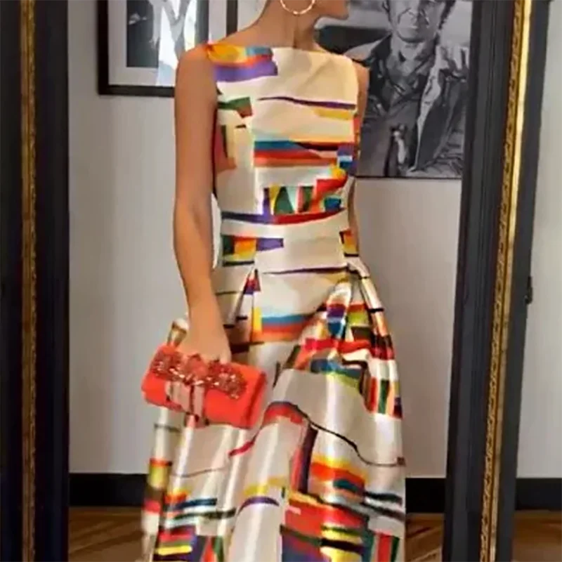 Model wearing the evening dress with a stylish clutch