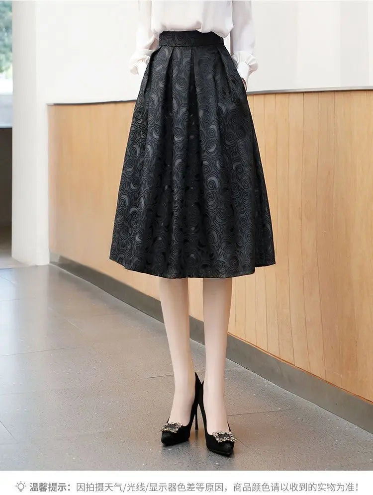 Soft pleats adding volume and elegance to the silhouette