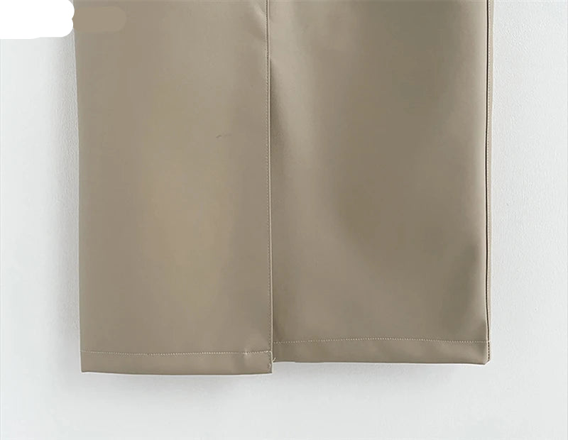 Full view of the skirt paired with a button-up shirt for a sleek office outfit