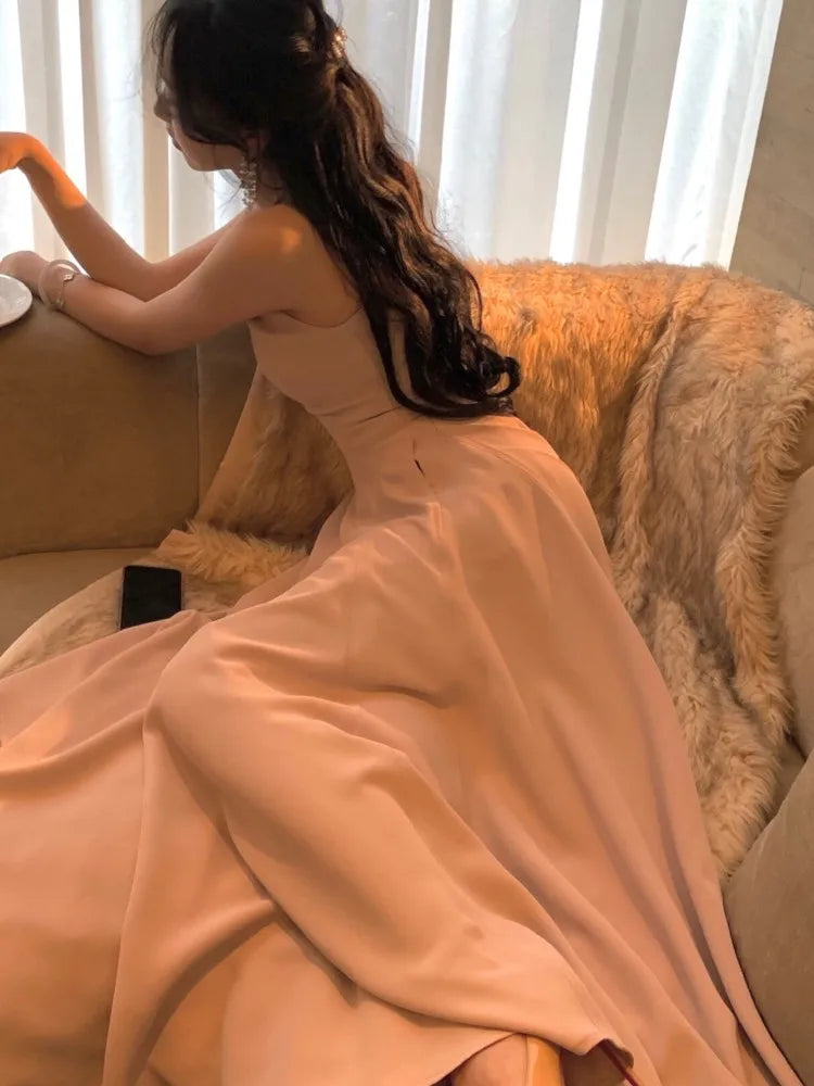 Model wearing the midi dress with high heels