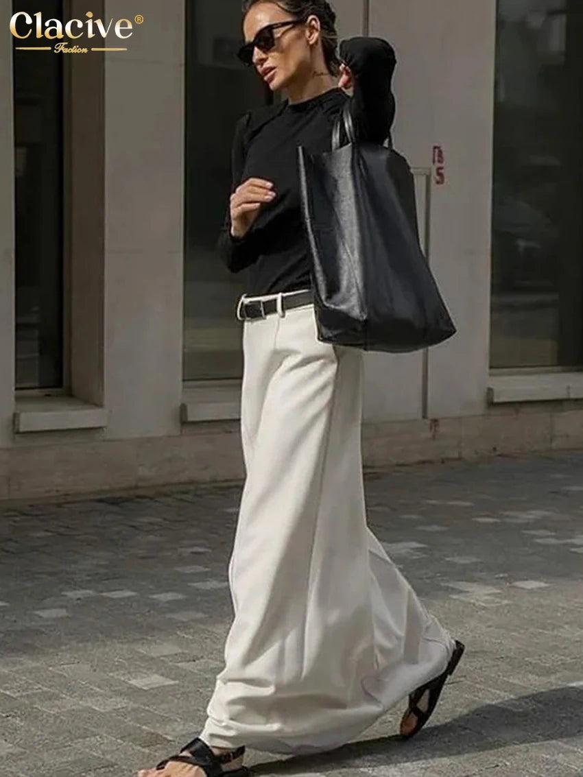Back view highlighting the graceful flow of the skirt