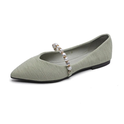 Women's flat shoes with a cushioned insole for added support.