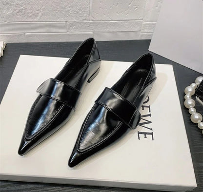 Sleek and sophisticated pointed toe leather flats.
