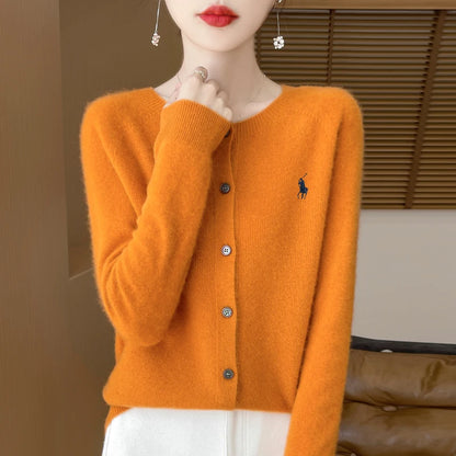 Model showcasing New Fashion Merino Sweater with scarf
