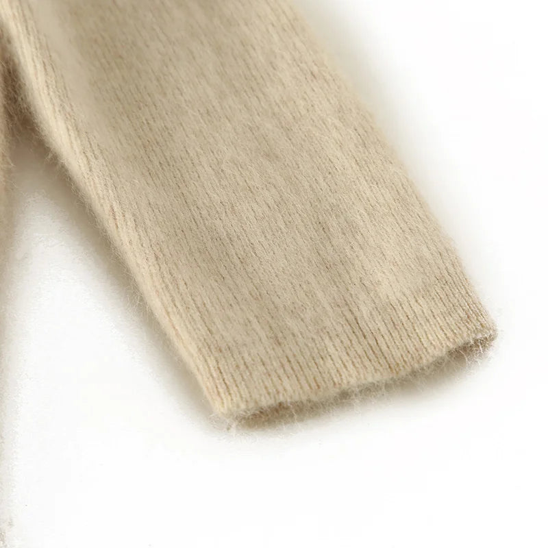 Close-up of soft mink cashmere fabric of the maxi dress.
