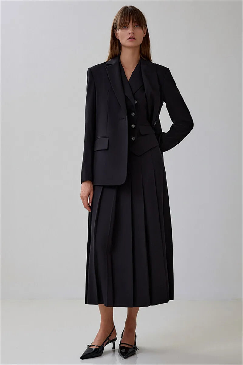 Model with Absobe Elegant Blazer Pleated Long Skirt standing outdoors