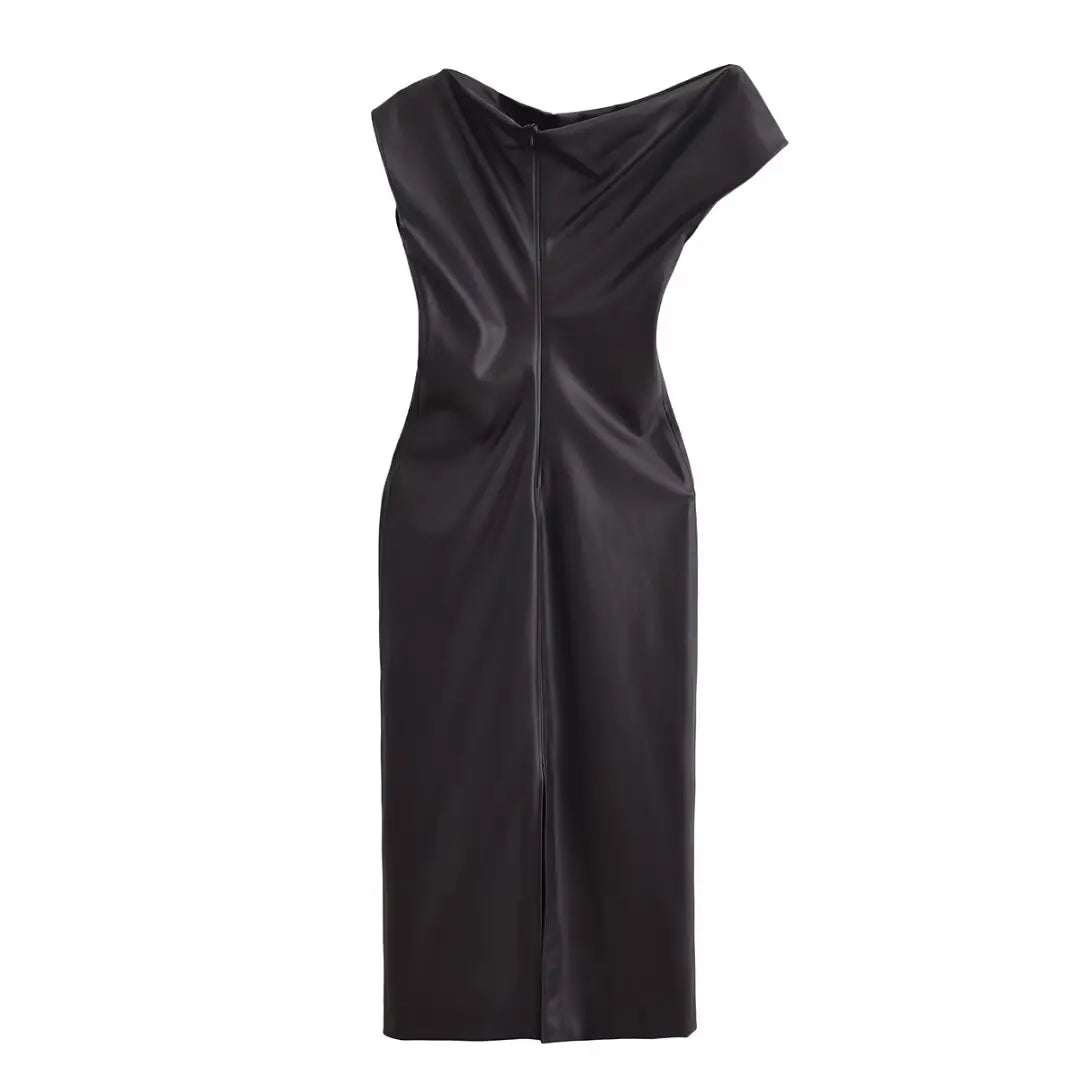 A side view of the black faux leather draped dress.
