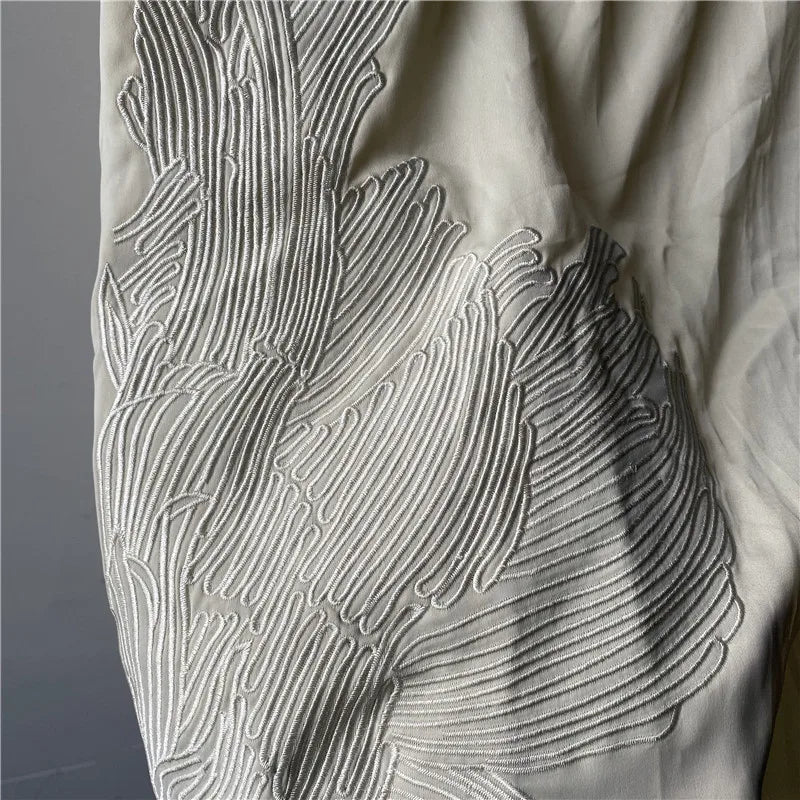 Close-up of the waistband and fabric showing the high-end finish of the skirt
