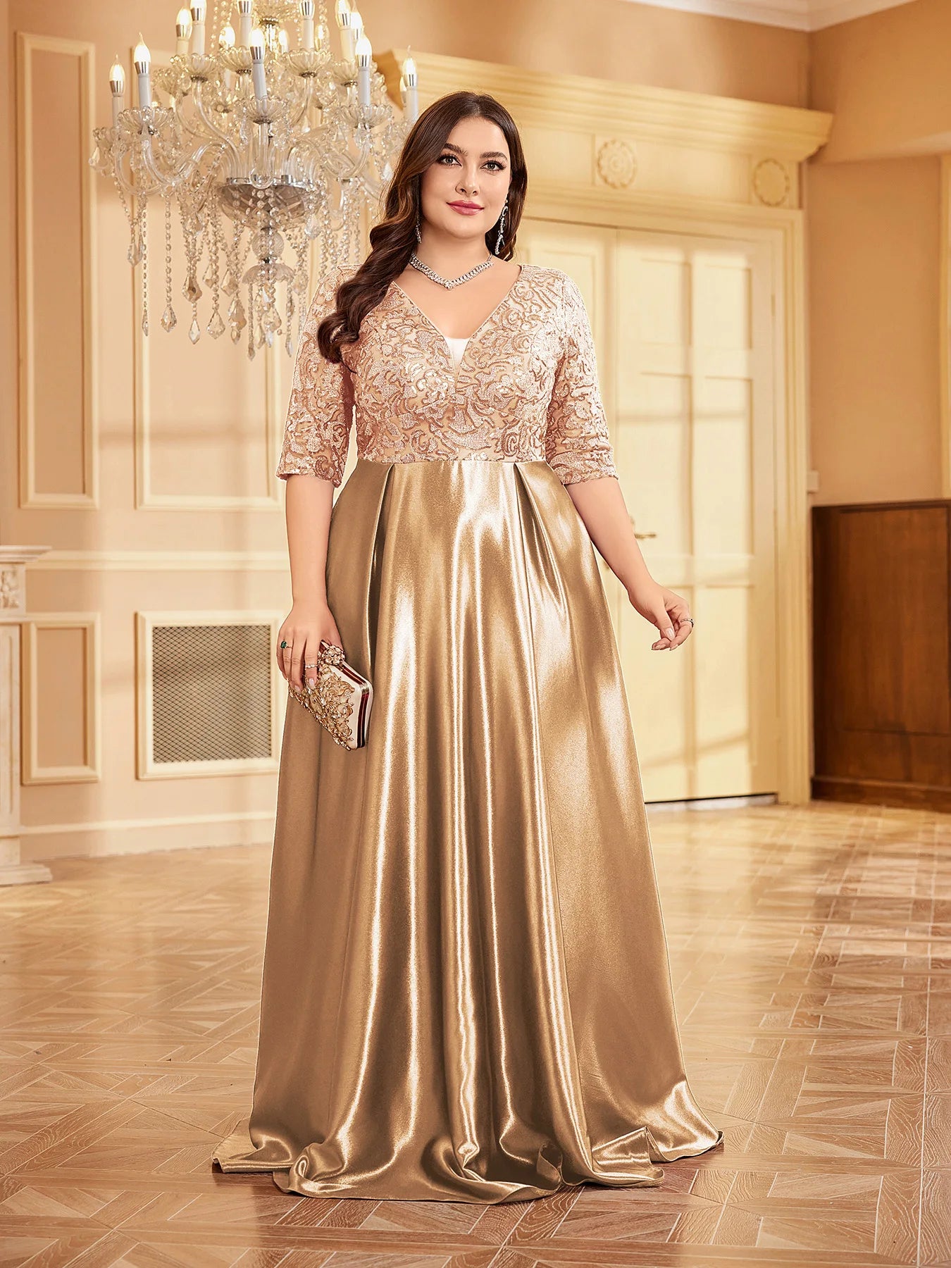 Gold satin gown with soft fabric detailing