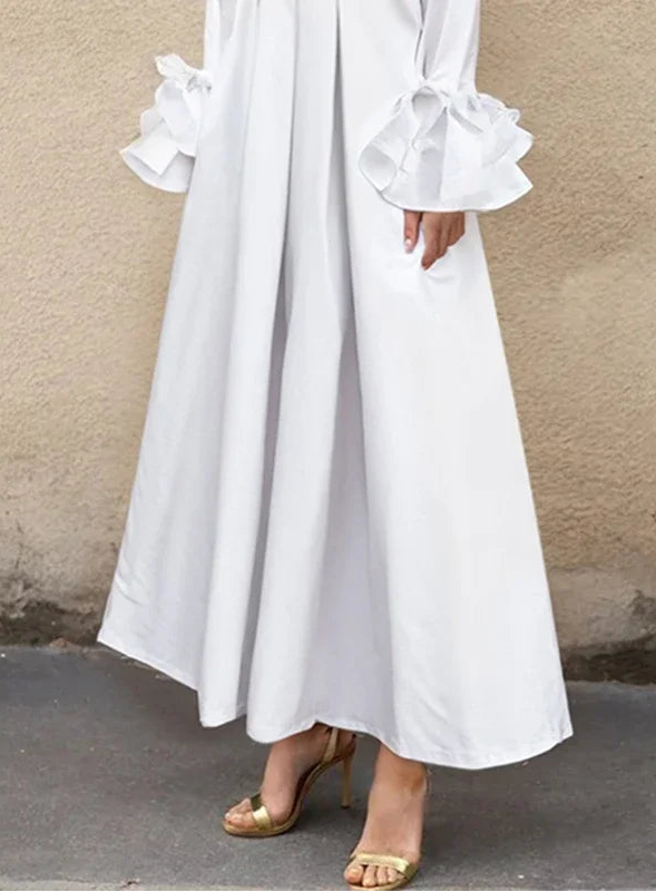  White flared sleeves blouse styled with denim
