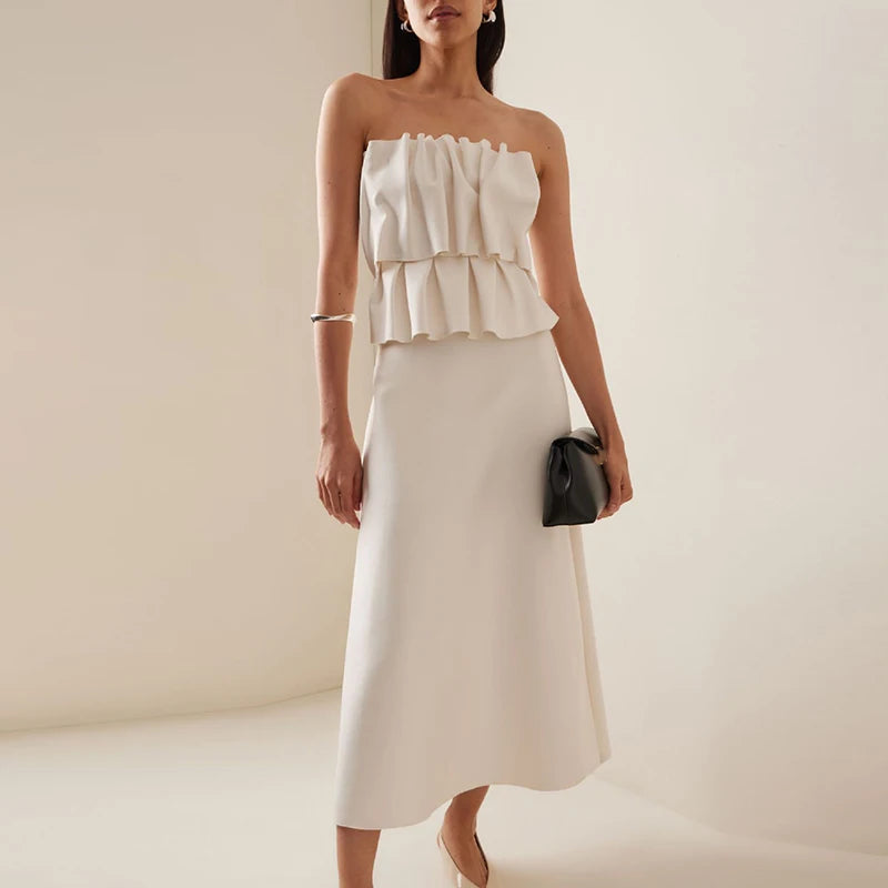 Elegant long A-line dress flowing silhouette.
