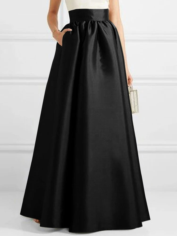 Side profile of the maxi skirt showcasing the A-line silhouette
