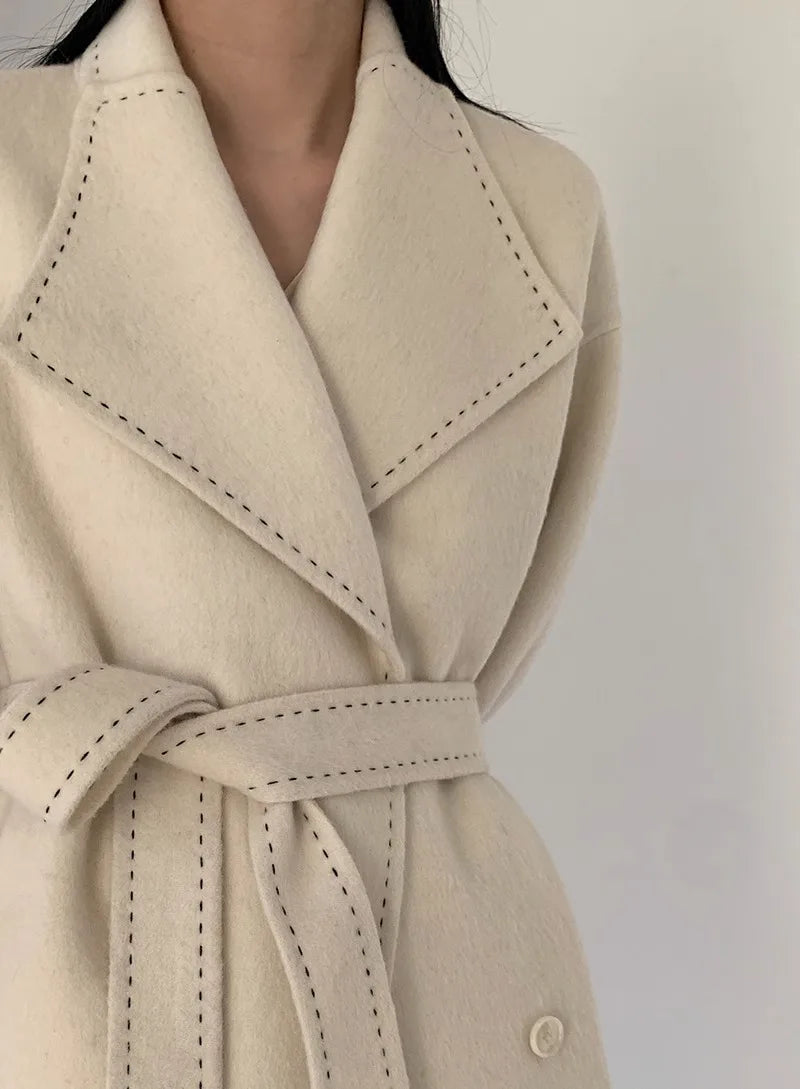 Full-sleeve detail on the cashmere and cotton-blend coat.