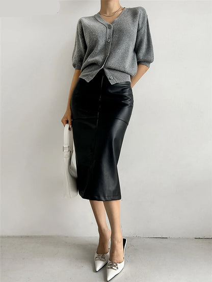 Fashion-forward look with the slim fit leather skirt and booties
