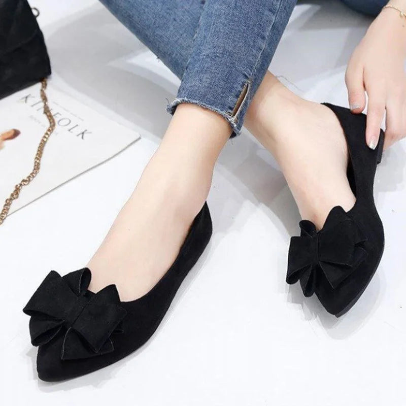 Comfortable cushioned insole of Black Bow Tie Flock Flats.