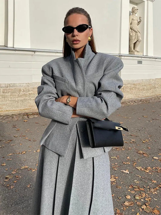 Long woolen skirt suit in gray with a matching tailored jacket