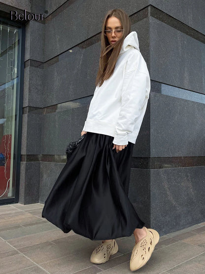 Close-up of the waistband and detailed stitching of the skirt
