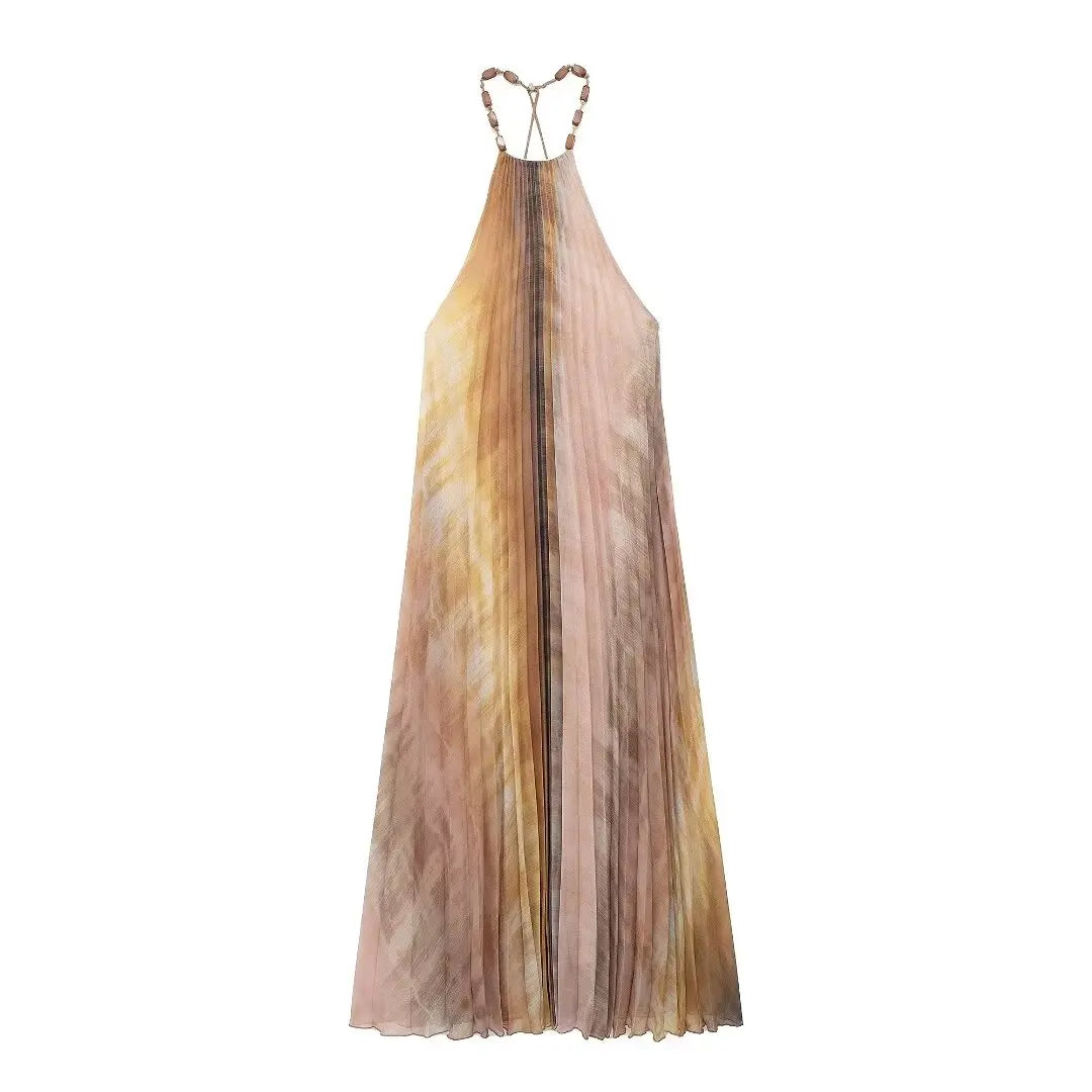 Tie-dye and pleats combine for a stylish look in TRAF Midi Dress.
