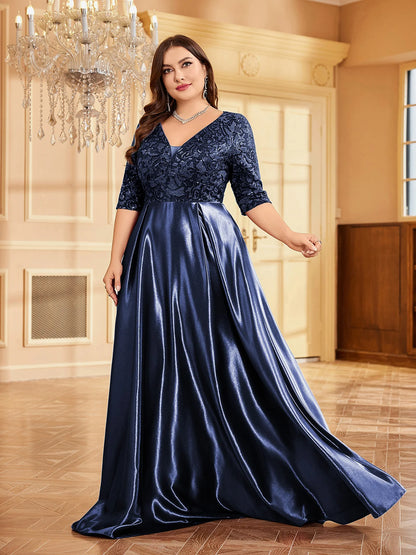 Model showcasing blue V-neck satin evening gown
