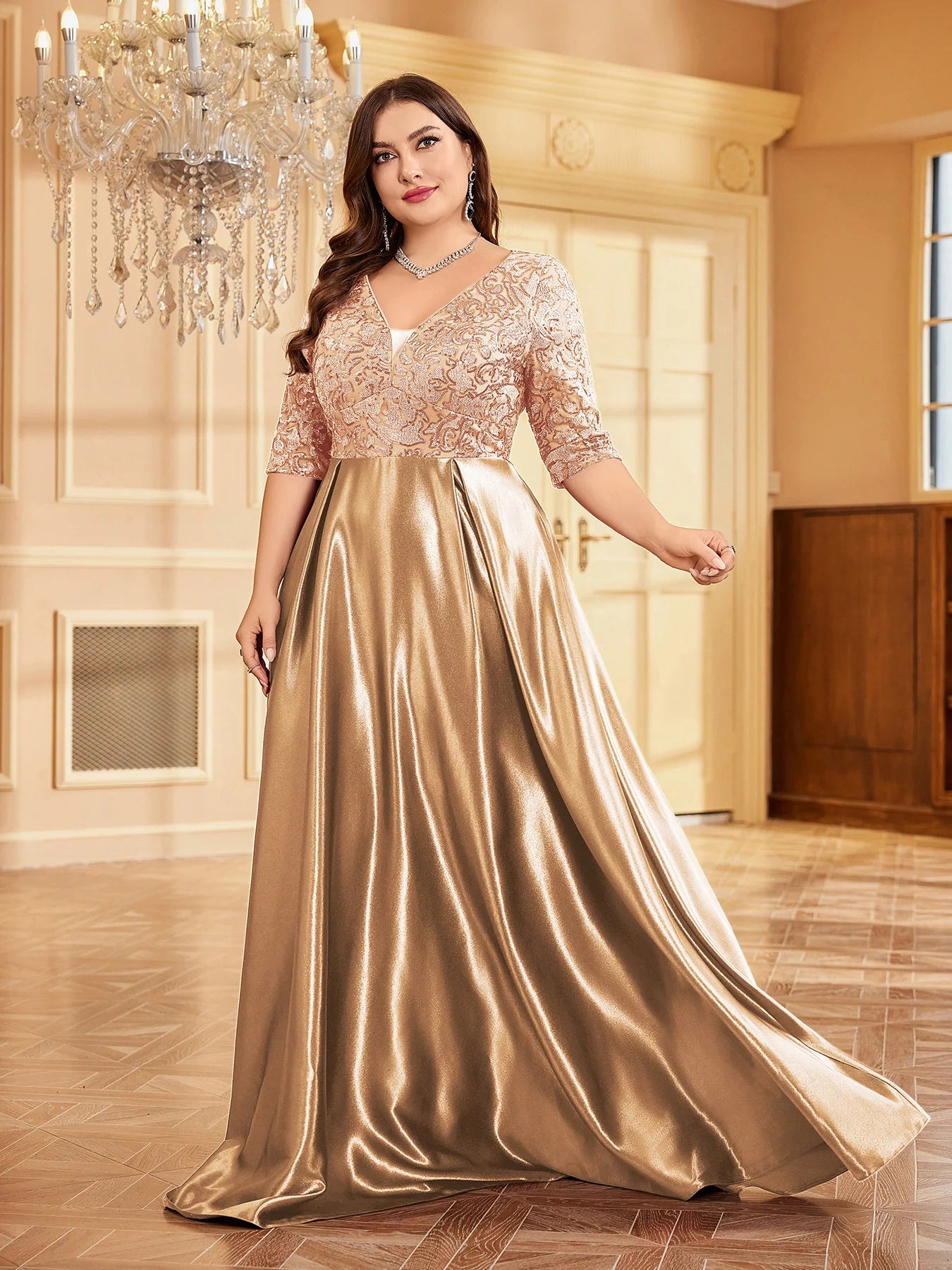 Elegant women’s evening dress in gold satin