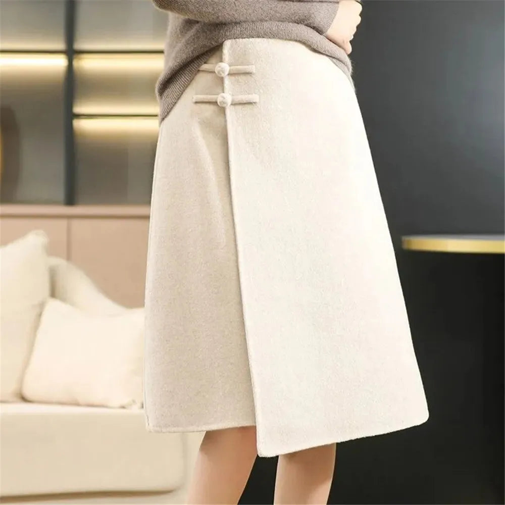 Side profile showcasing the asymmetric split and midi length of the skirt
