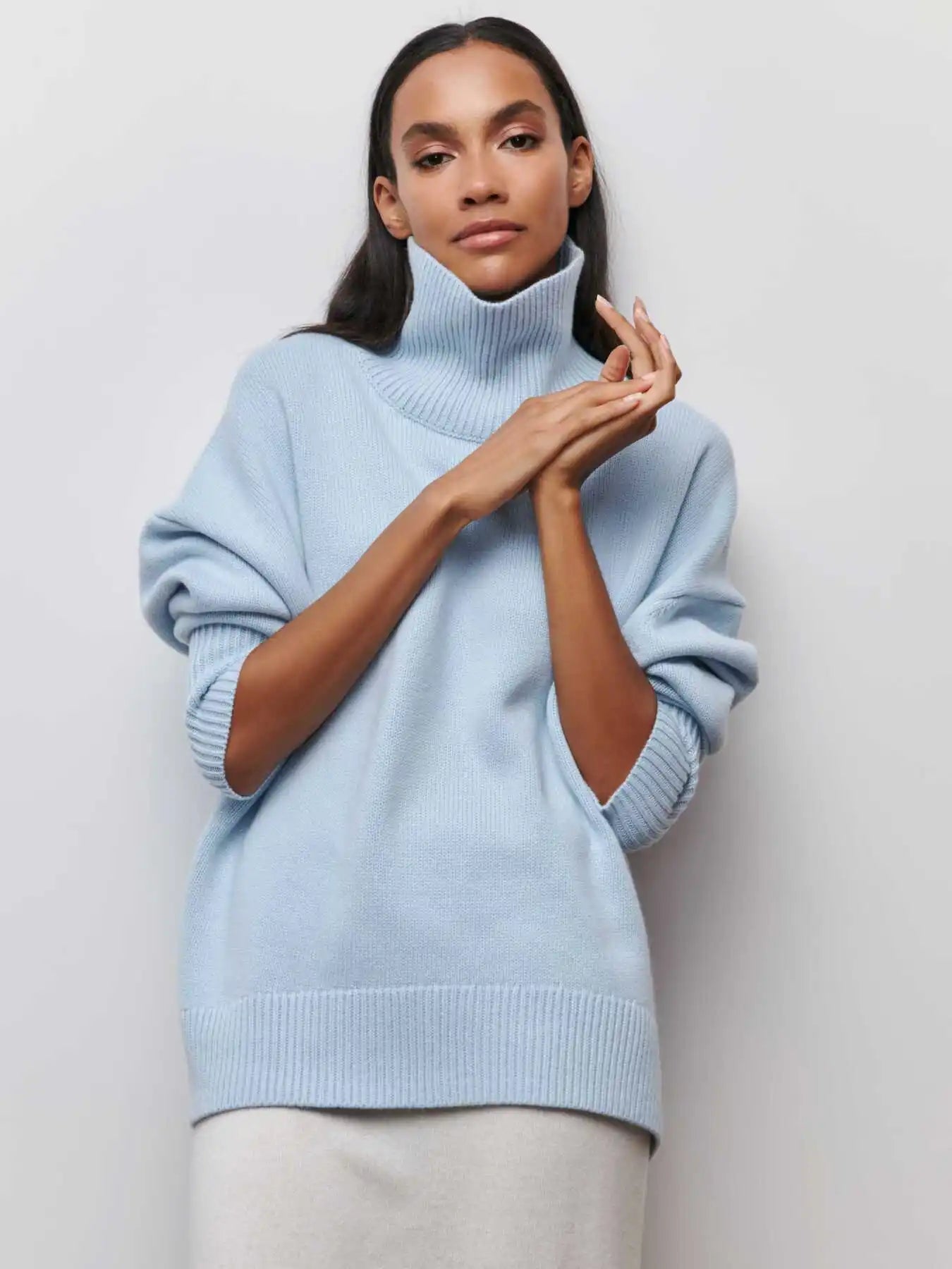 Soft knitted fabric of the Original Light Luxury O-neck Knit Sweater in Lite Blue
