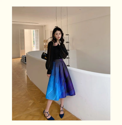 Full-length view of the Hepburn-inspired skirt styled with a blouse
