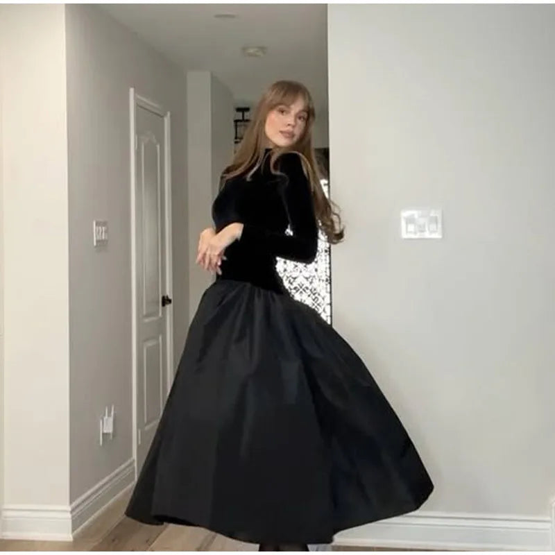 Elegant formal black pleated satin dress
