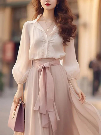 Elegant long sleeve dress with lace-up design.
