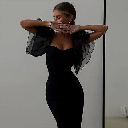 Side profile showcasing the sleek bodycon fit of the dress
