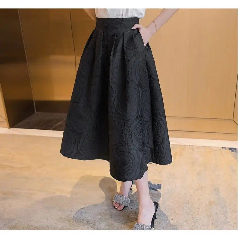 Elegant and sophisticated styling of the black loose midi skirt
