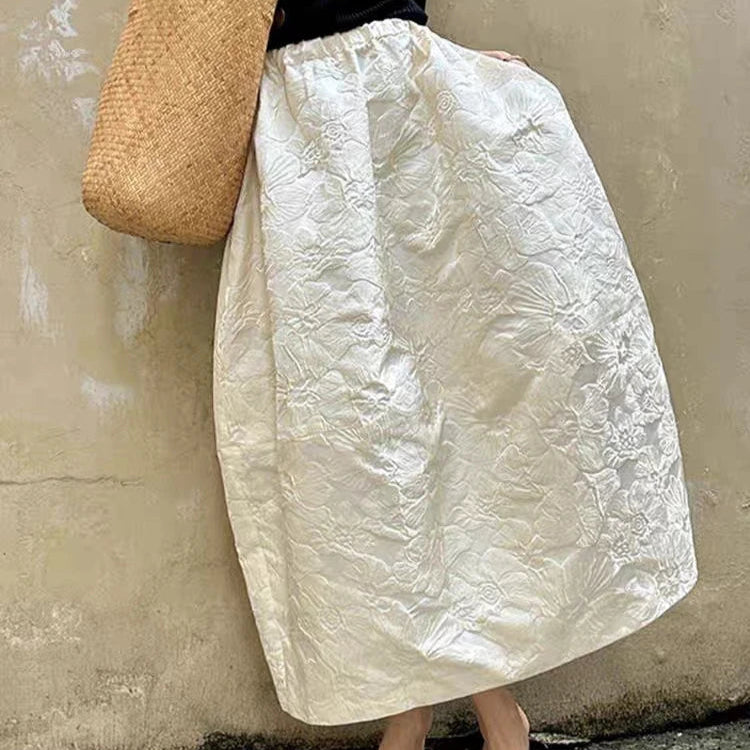 Loose skirt with a flowing design in a breezy outdoor setting.
