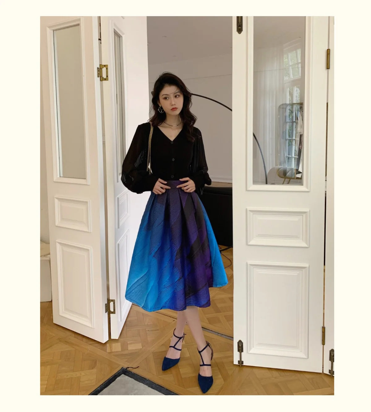 Model twirling in the vintage-style chiffon skirt for added movement
