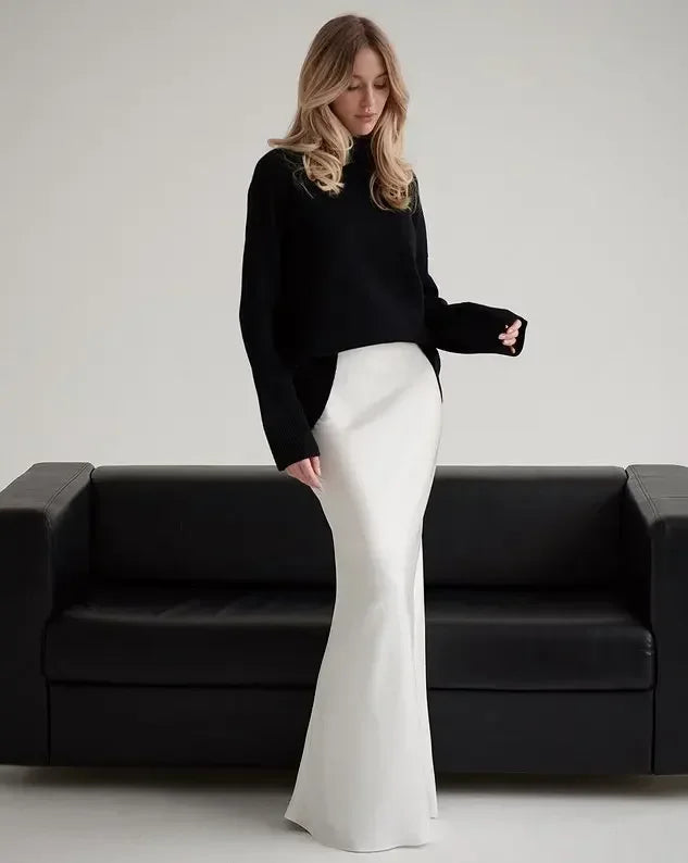 Model showcasing the satin skirt in a casual setting
