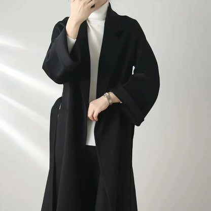 Versatile water ripple wool coat for formal and casual looks.