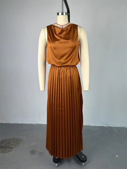 Back view of CM.YAYA Sleeveless Vest and Pleated Skirt
