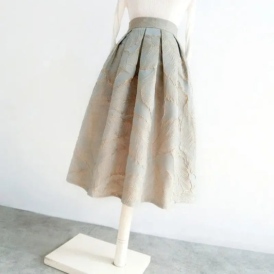 High-waisted fit of the skirt adding structure to the outfit
