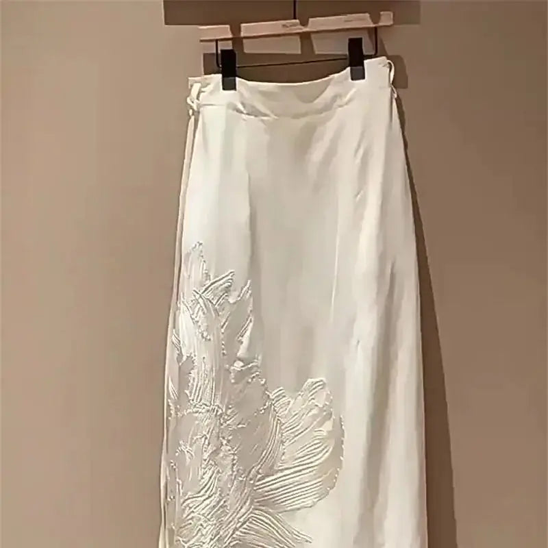 Full-length view of the skirt styled with a fitted blouse for a chic, polished look
