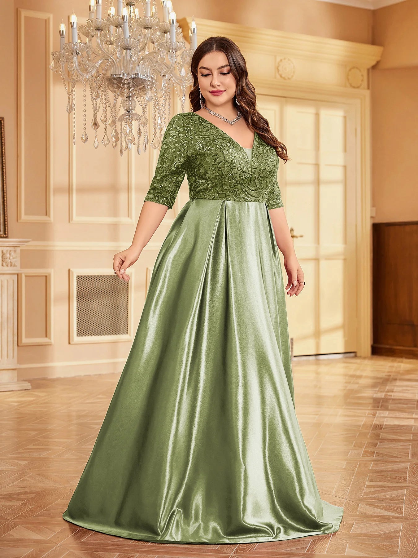 Draped satin evening dress in green color
