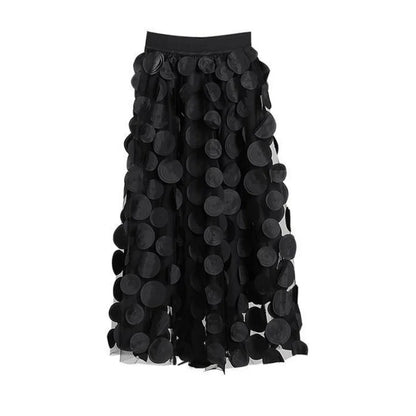 Lightweight tulle mesh with intricate 3D polka dots.
