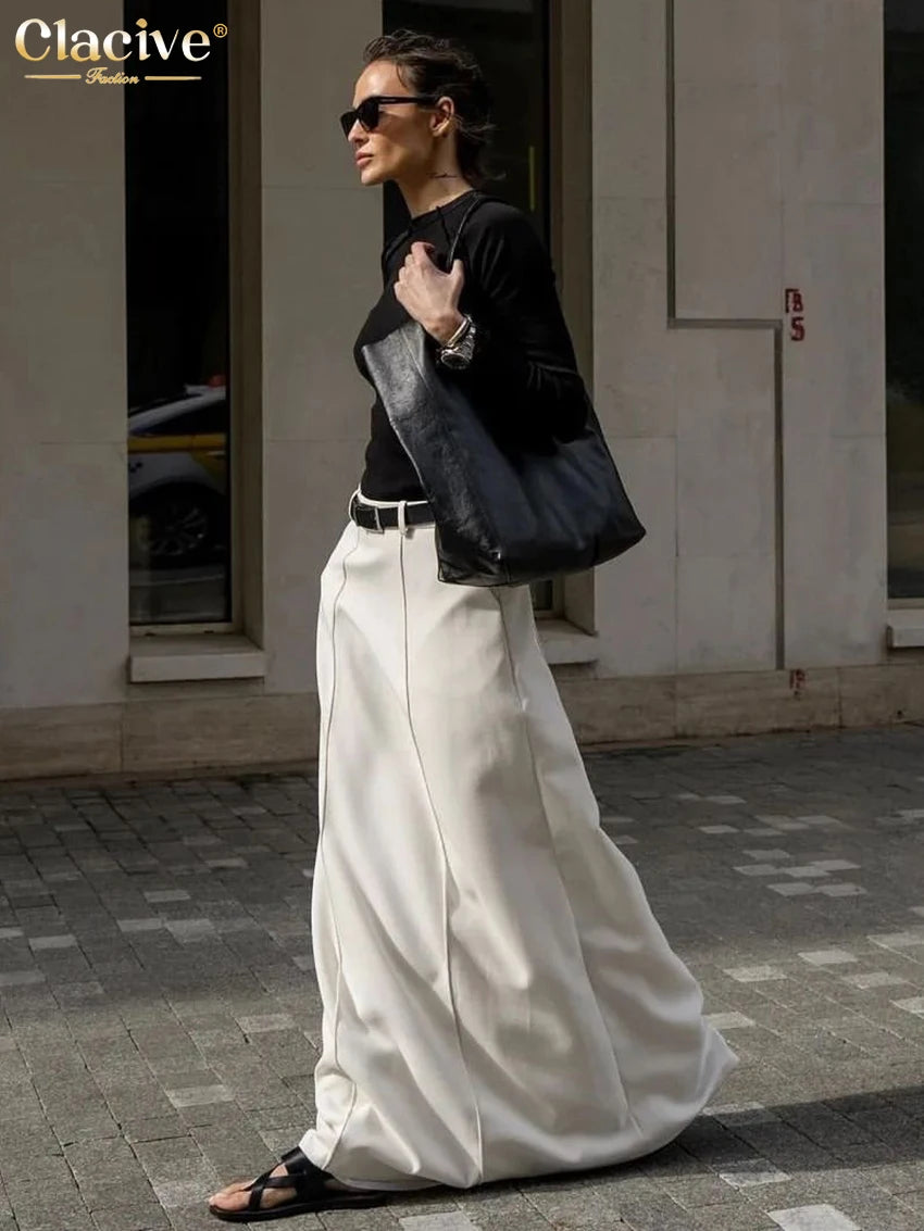 Model wearing the skirt with pumps for a polished outfit
