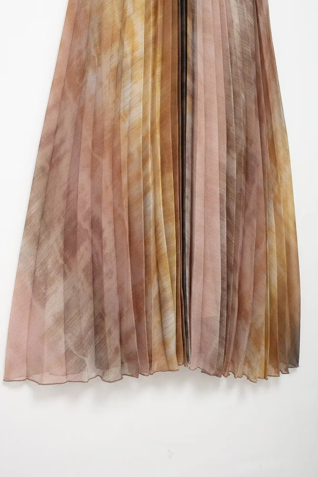 Close-up of pleats and fabric texture in TRAF midi dress.
