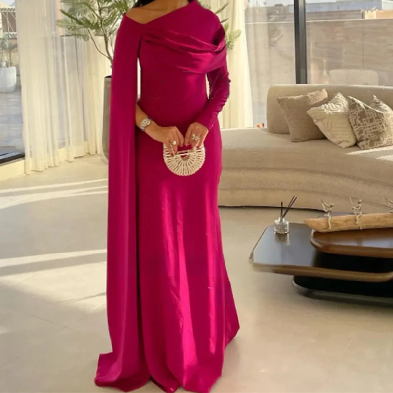 Side view of women's crepe long sleeve gown
